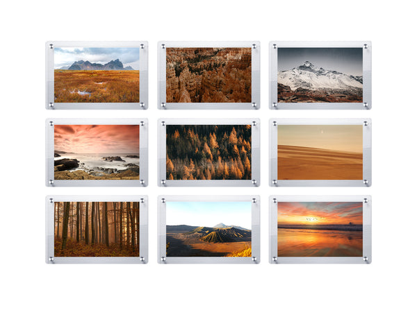 Photo of a gallery wall of landscape pictures using modern acrylic floating picture frames